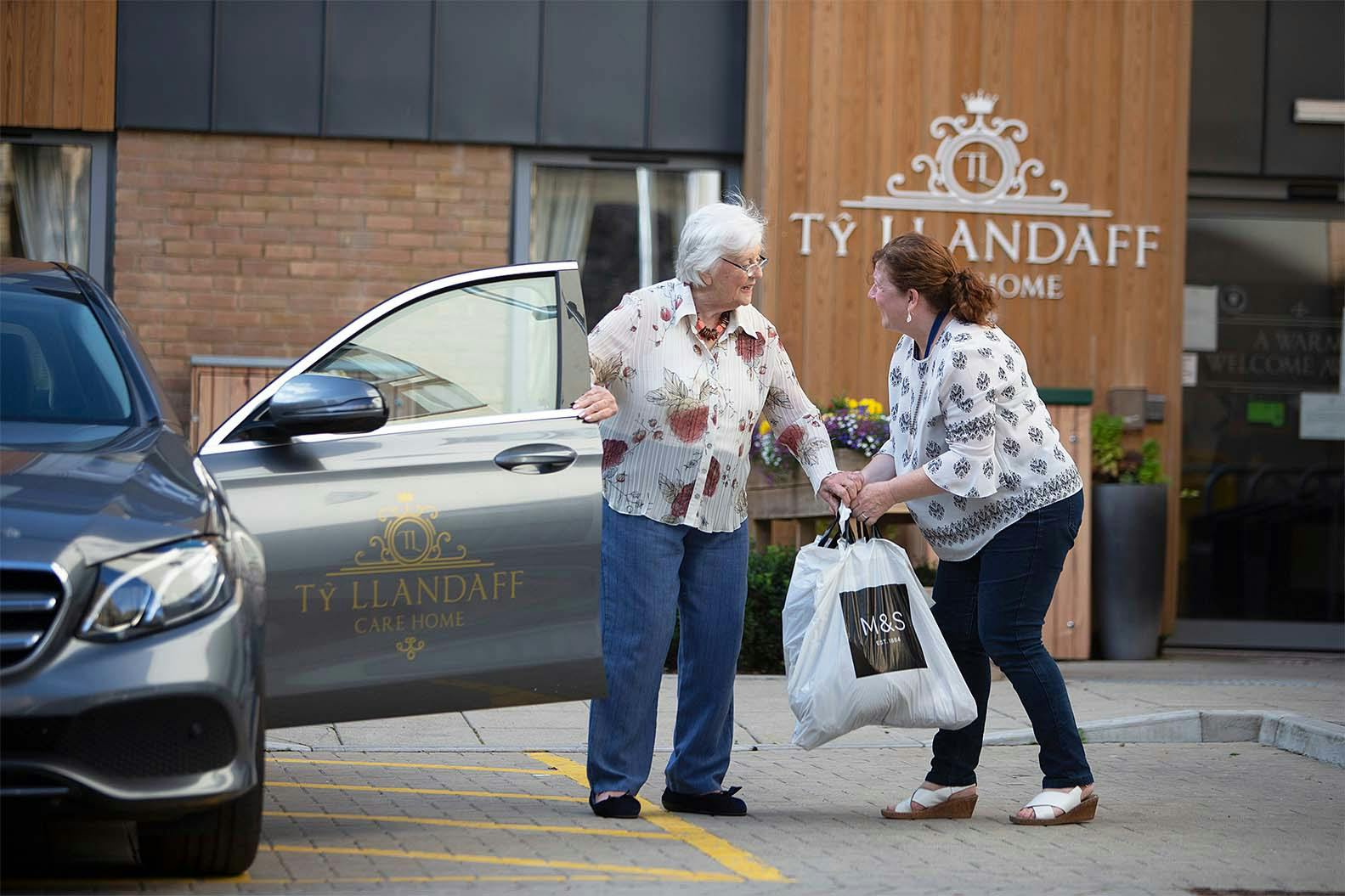 Staff Helping Resident With Shopping