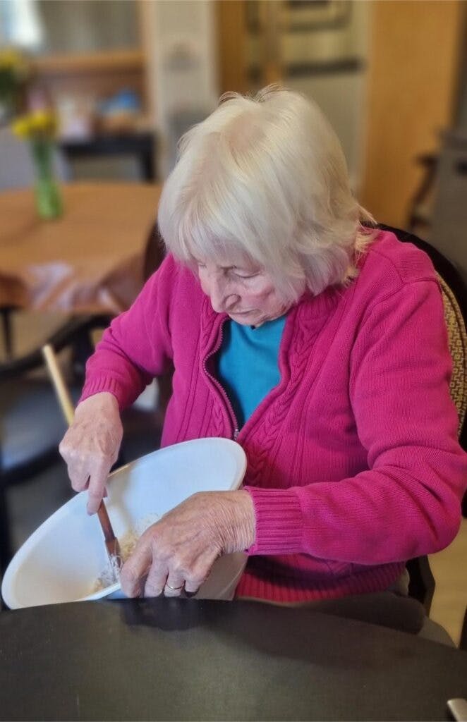 resident mixing welsh cake mixture