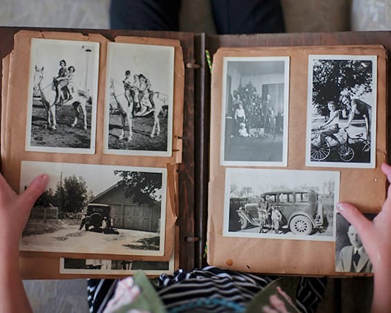 A resident looking through a photo album