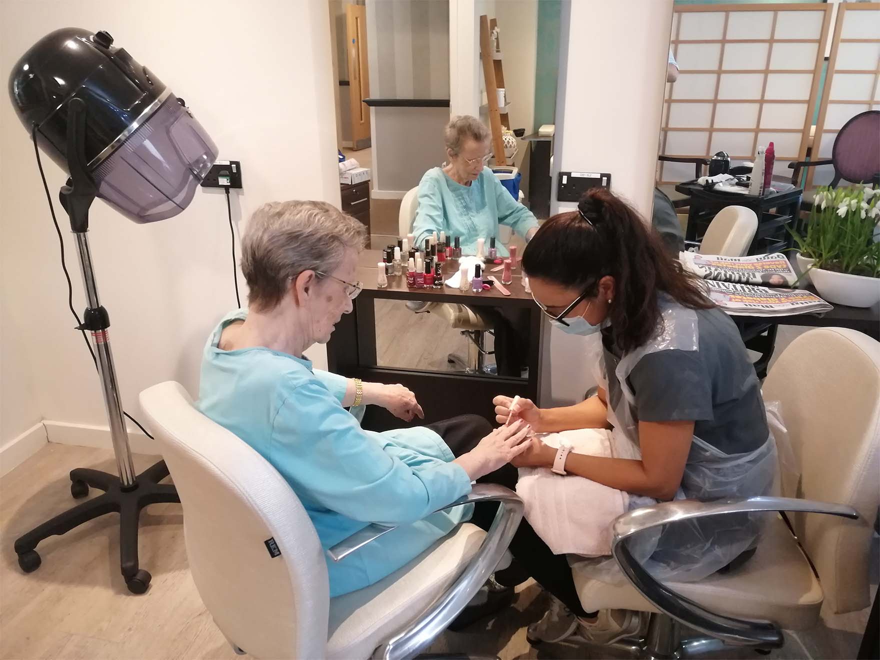 Resident Getting Their Nails Done