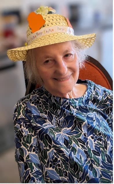 resident wearing easter bonnet