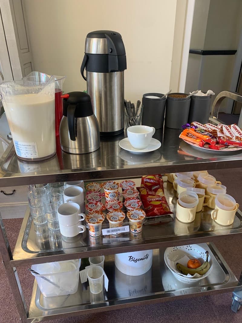 snack trolley with drinks and yoghurt on it