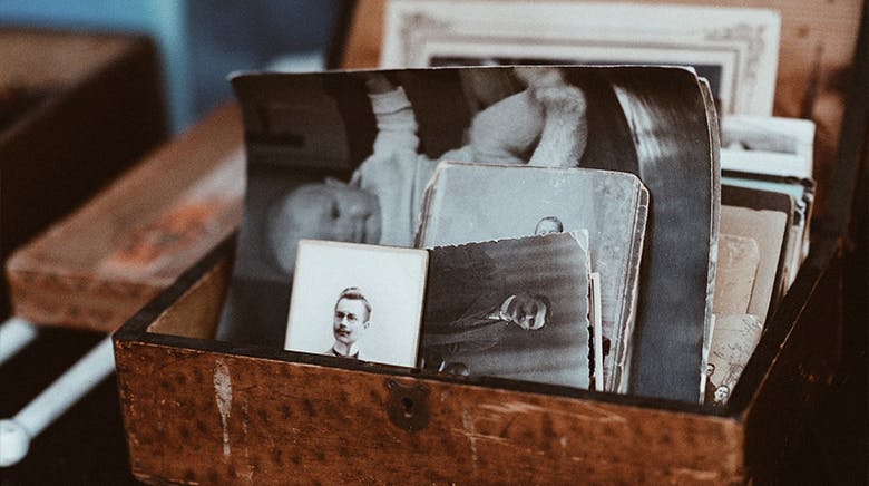 A brown box of old photos