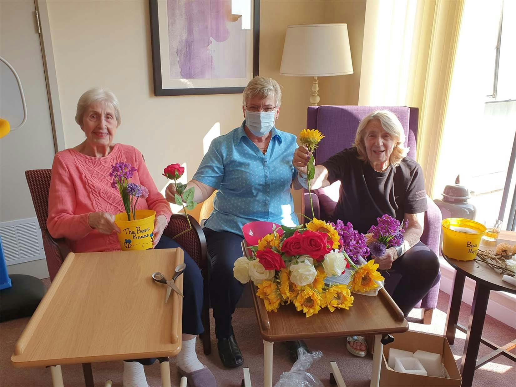 Our residents arranging flowers at Ty Llandaff Care Home