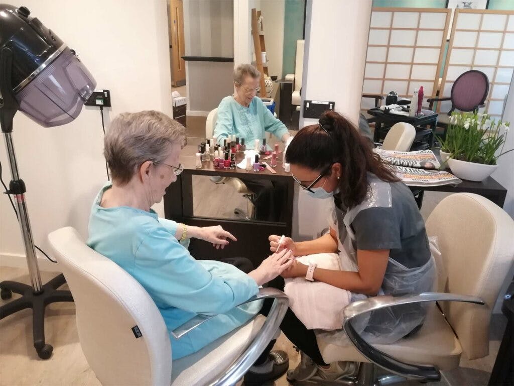 Resident Getting Their Nails Done