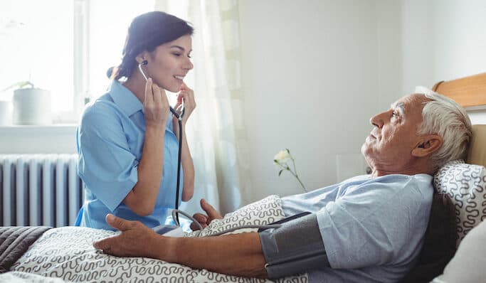 Resident Having Blood Pressure Taken